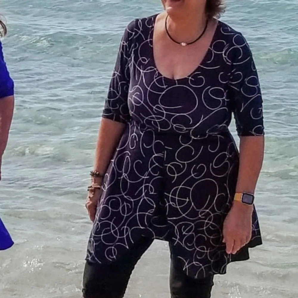 The Swim Dress is a full-coverage swimsuit XL (18/20)